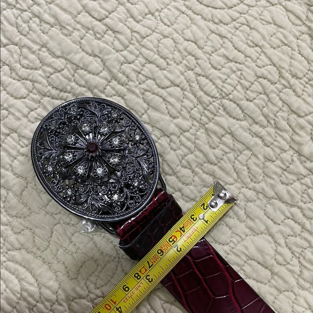 WHBM statement , burgundy, snake skin patent belt with jewel buckle